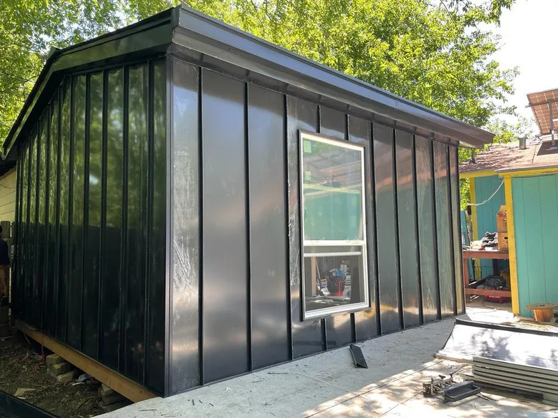 Black standing seam metal wall panels for Roof Inspection in Hampden